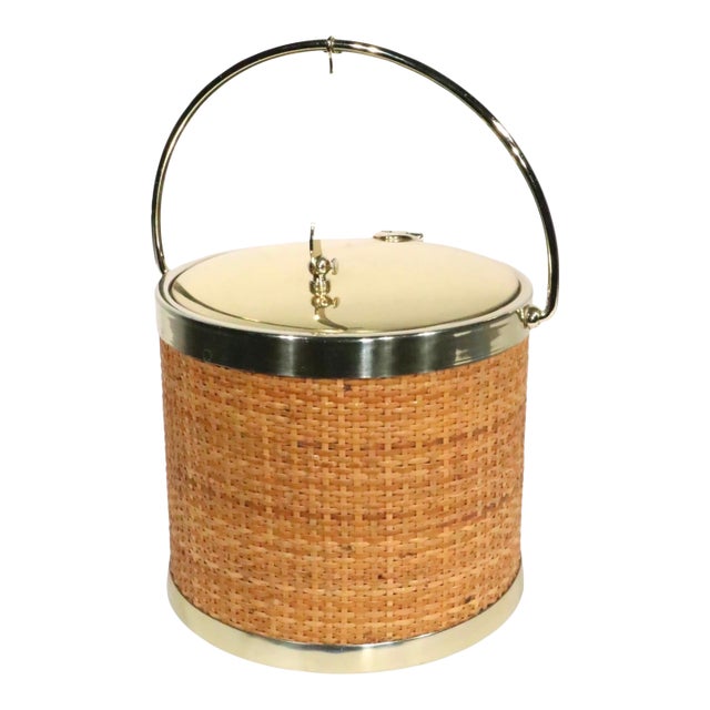Mid Century Hollywood Regency Raffia Wrapped Brass Plated Ice Bucket by Kraftware New York C. 1970's For Sale