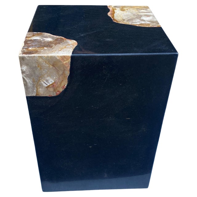 Volcanic stone panels are joined together with a contrasting tone of petrified wood added on two corners. Modern yet with...