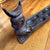 This item is a vintage, hand-carved wooden Mancala sculpture. This ornate carved sculpture is traditional "count-and-...
