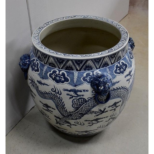 Large Belly Vase in Cream Ceramic, with Chinese decoration in Blue colour. Its large opening of 36 cm in diameter is lined...