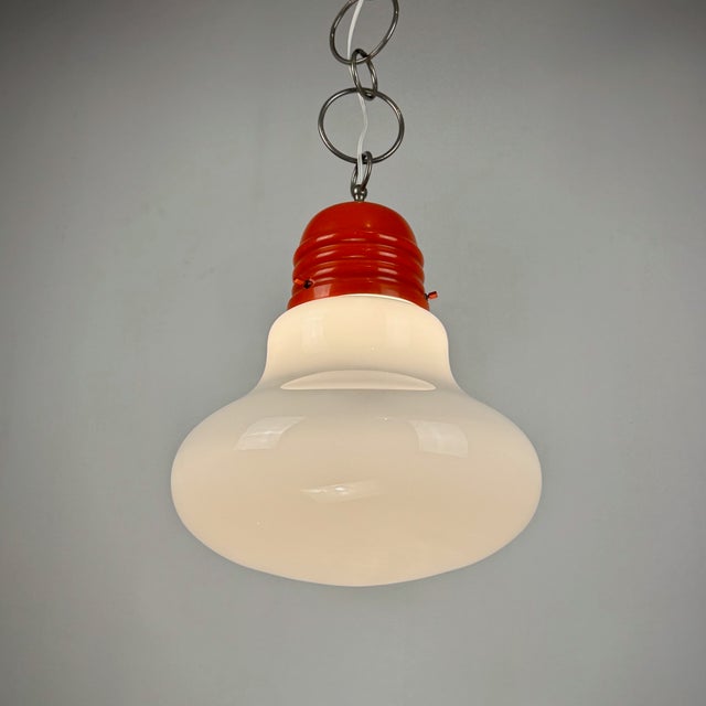 Mid-Century Modern Italian Bulb Pendant Light, 1970s, in Good conditions. Designed 1970 to 1979 This piece is designed in...