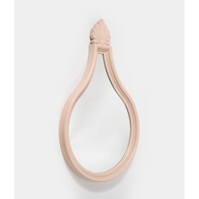 carved and painted maple and walnut wood; mirror plate. Can be hung in any direction