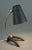 A rare model b52 table lamp designed by erik wärnå and produced by ewå värnamo, sweden, during the 1950s. Combining...