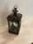 This listing features a small brass pendant with clear glass and tinted green glass
