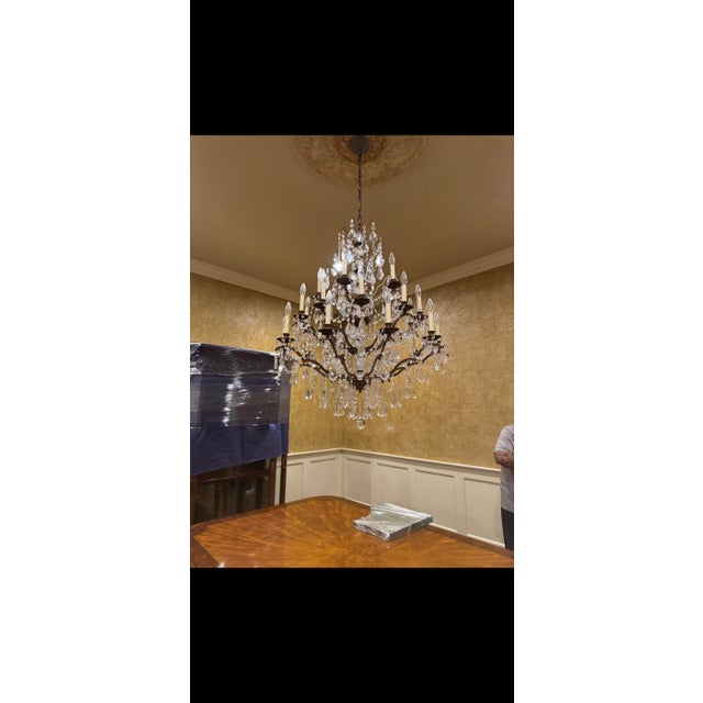 Monumental French Crystal and Bronze Chandelier in the Style of Baccarat An impressive multi-tier French-style chandelier...