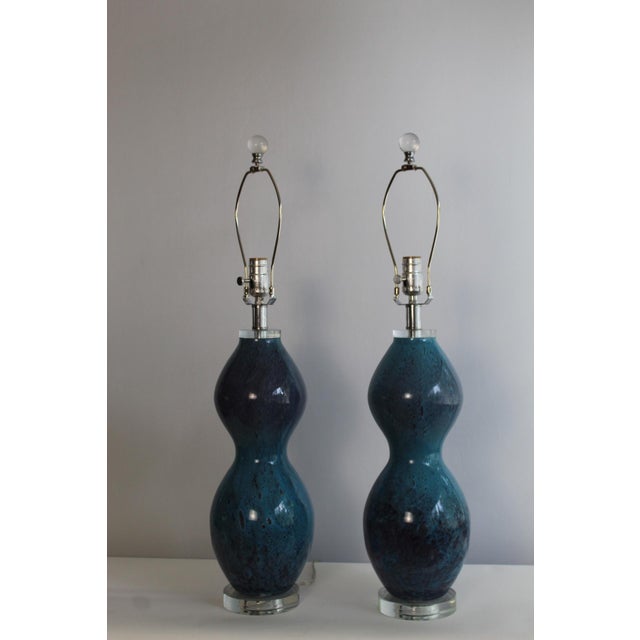 Beautiful pair of sculptural style Murano glass Lamps. Hand blown which creates a lava like molten bubbles in teal blue...
