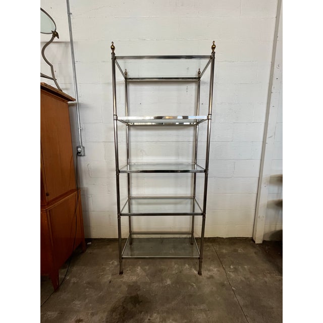 Maison Jansen Hollywood Regency Chrome and Brass Étagère . Timeless and sophisticated style shelving with two-tone brass...