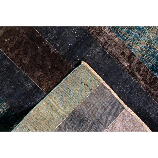 Beautiful vintage Persian Overdyed hand-knotted wool runner with a gray field. This rug has brown, beige, and teal accents...