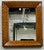 Wonderful little mirror with intricately inlaid frame. Can be used on the wall at ont the easel as a dressing mirror.