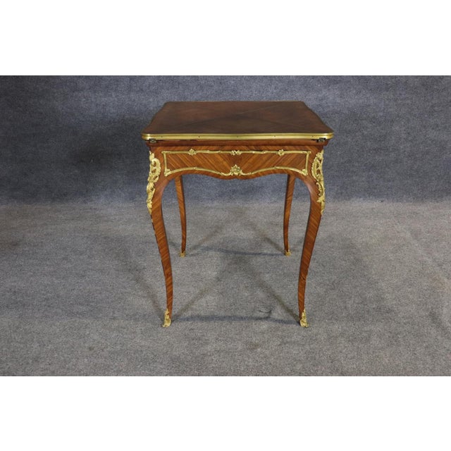 Measures 23.25 x 23.25 wide x 29.25 tall and 31.5 wide x 31.5 when open. There are tables made for cards, and there are...