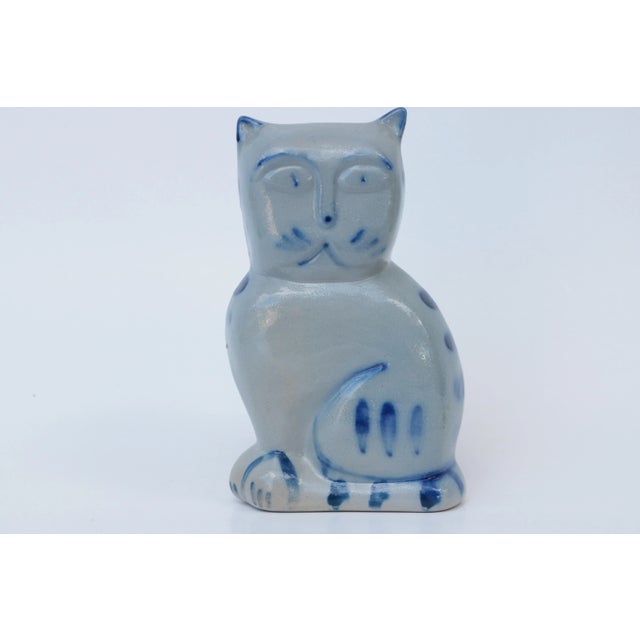 Stoneware pottery cat in grey salt glazed stoneware highlighted with cobalt blue accents. From Eldreth Pottery of...