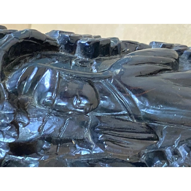 Brush holders, or pen holders, from Japan made of wood at the beginning of the 20th century. Characters and landscapes are...