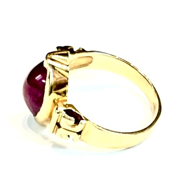 14k yellow gold oval ruby ring, 6.0 Grams TW. The dimensions of the ruby are approximately 11.5 mm x 7.5 mm. Approximately...