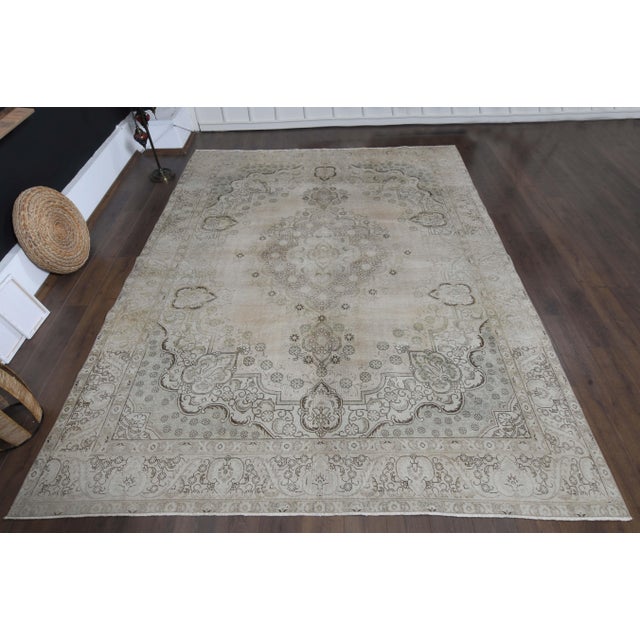 Vintage Persian Hand-Knotted area rug is a semi-antique vintage area rug. The '70s Eastern region of Anatolian's unique...