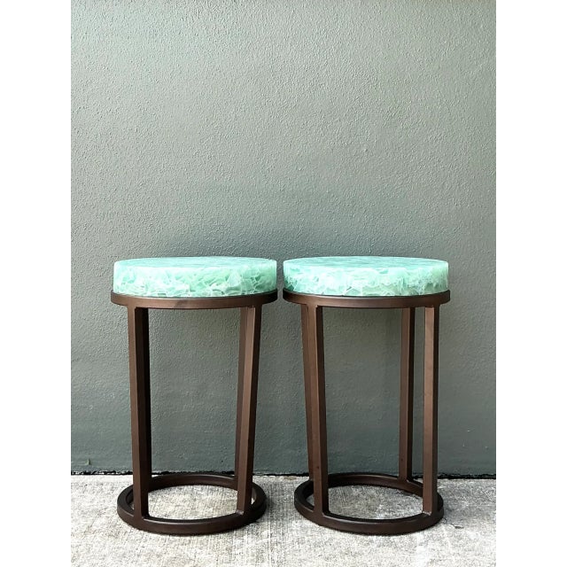 Showcasing a balance of industrial structure and natural materials, this pair of vintage cylindrical side tables features...