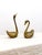 Add timeless elegance to your home with this charming set of vintage brass swan figurines. Perfect for a mantel,...