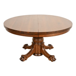 R. J. Horner Style Antique Victorian Carved Oak Split Pedestal Extension Dining Table With Lion Paw Feet | Newly Refinished For Sale