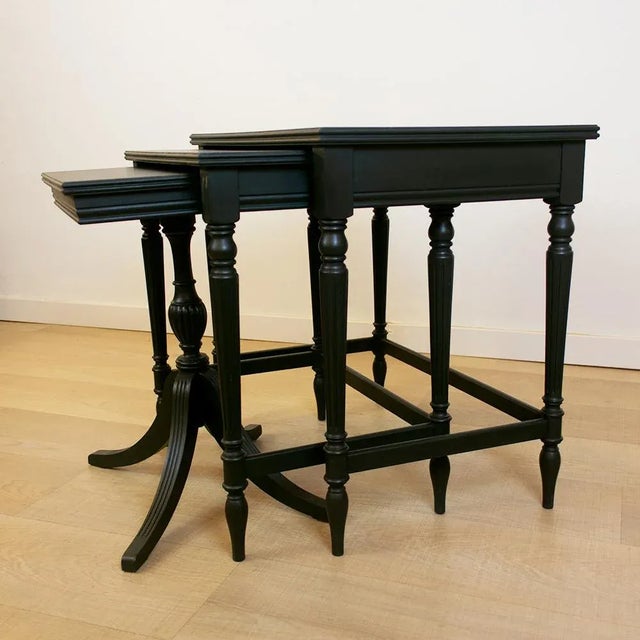 Set of 3 nesting side tables from the 1950s, restored and painted in a dark green colour. Measurements: Lengths: 60 cm -...