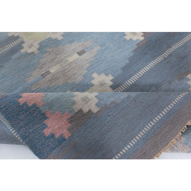 Vintage Swedish Flat-Weave Rug by Ingegerd Silow Size: 4.7" × 6.8" (139 × 203 cm) Celebrate the refined artistry of...