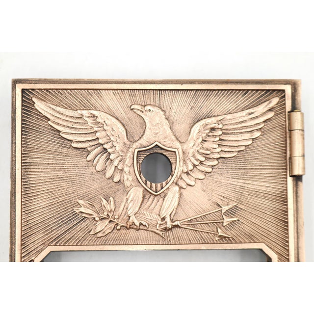 Vintage U.S. Post Office PO box door, a popular collectible often dating from the early to mid 20th century. It is made of...