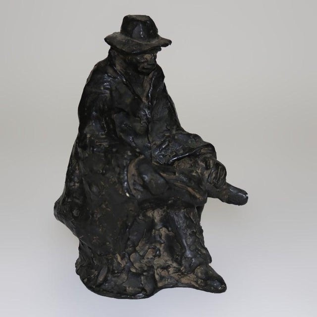 Antique Bronze Sculpture “The Sittin’ Man” Signed Petronzio C1930. 8 3/4" x 5 1/8" x 5 5/8". A captivating bronze...