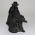 Antique Bronze Sculpture “The Sittin’ Man” Signed Petronzio C1930. 8 3/4" x 5 1/8" x 5 5/8". A captivating bronze...