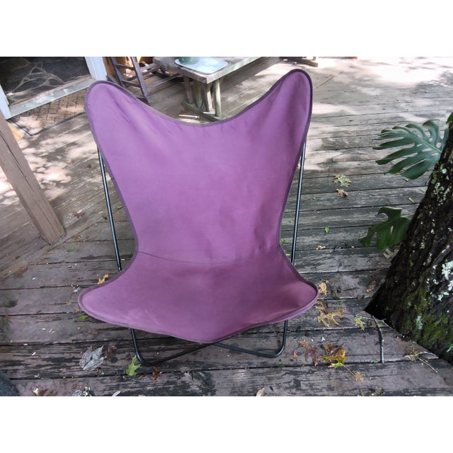 Mid-Century Modern Welded Solid Wrought Iron BKF Butterfly Chair with Purple Canvas Cover Offered is a classic mid-century...