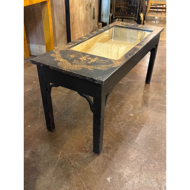 The Antique Italian Chinoiserie Low Table features a unique blend of Italian craftsmanship and Chinese-inspired design,...