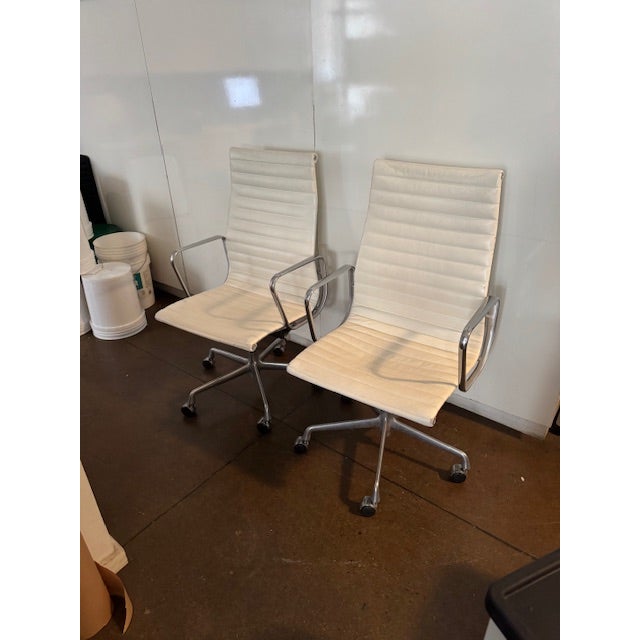 Two Eames polished Aluminum and Vicenza leather Executive office chairs. Extremely comfortable.