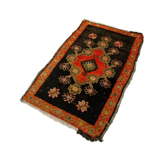 Vintage Handknotted decorative mini rug from Kars region of Turkey. Approximately 45-55 years old. In very good condition.