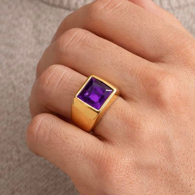 Square Amethyst Signet Ring in Gold Confident and timeless, this ring features a striking square-cut amethyst set flush...