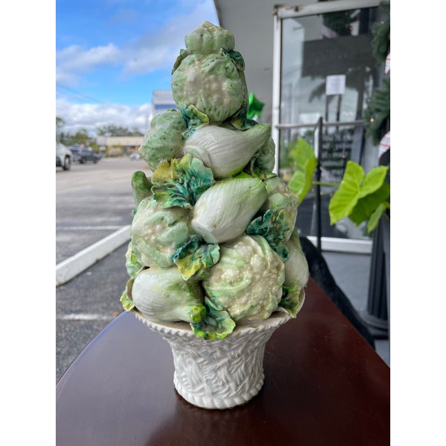 Add a burst of cottage-kitchen charm to your shelf, island, or dining table with this vintage ceramic vegetable topiary....