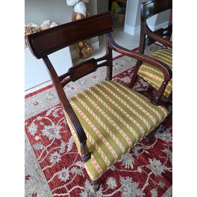 This is a pair of gently used mahogany Regency arm chairs. The overall condition is excellent and the wear is consistent...