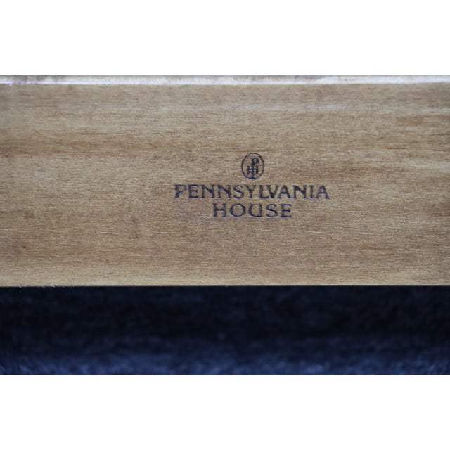 Pennsylvania House solid oak headboard featuring a shaped crest, turned posts, and warm oak grain. Designed to work as...