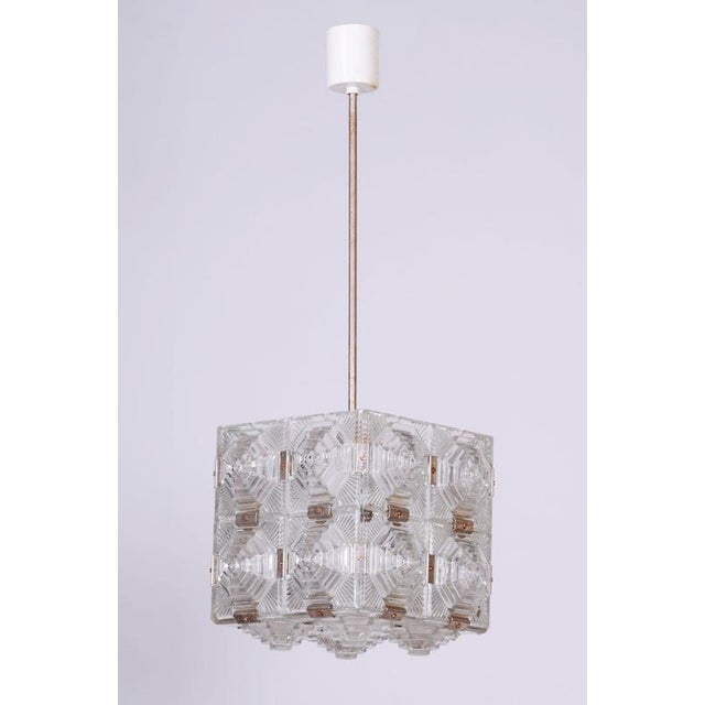 Maker: Kamenický Šenov This stylish and highly elegant chandelier, originating from the 1960s from Czechoslovak production...