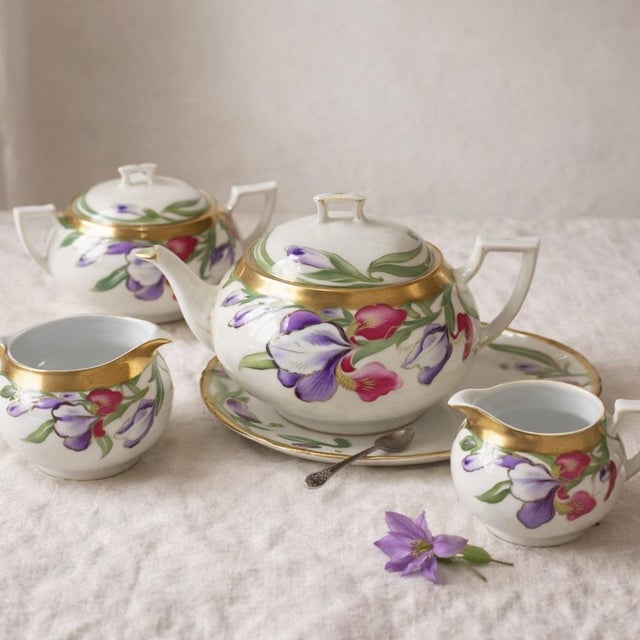 Offering an antique Tea Set from from Tirschenreuth (P.T.) Bavaria, Germany. This four piece set is beautifully hand...