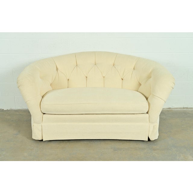 A gorgeous and very comfortable Mid-Century Hollywood Regency tufted sofa or loveseat By Baker Furniture USA, Circa 1960s...