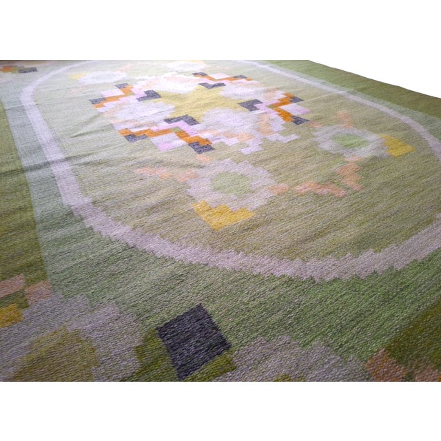 Beautiful large handwoven rölakan wool rug designed and signed by Ingegerd Silow, one of Sweden’s most celebrated textile...