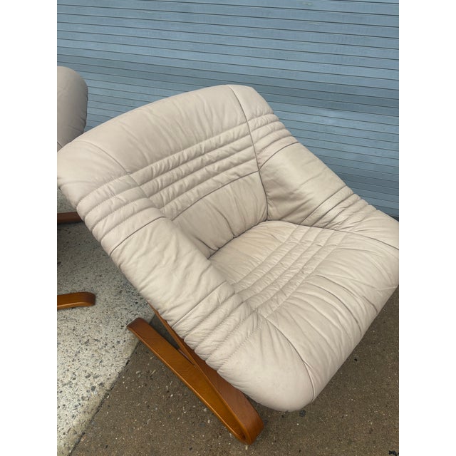 Norwegian Cantilevered Molded Teak Plywood Lounge Chairs. In great condition! Leather is near perfect! Chairs sit really...