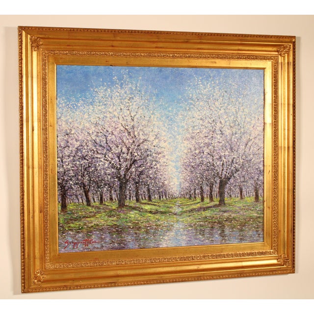 Impressionist painting of blossoming cherry trees by California artist James Scoppettone (Born 1937). Oil on canvas. Frame...