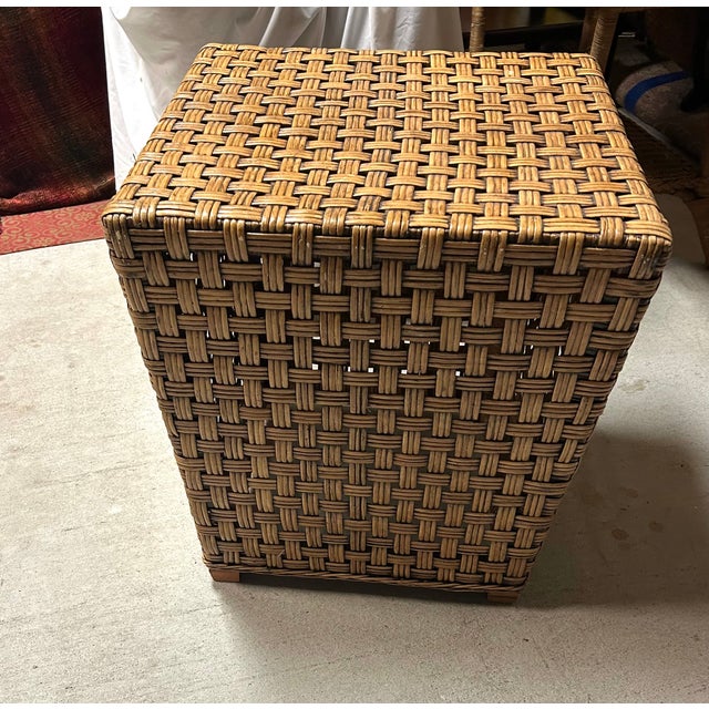 This natural color cube shaped wicker table has a lovely pains on its charming basket weave. It is great for outdoor...
