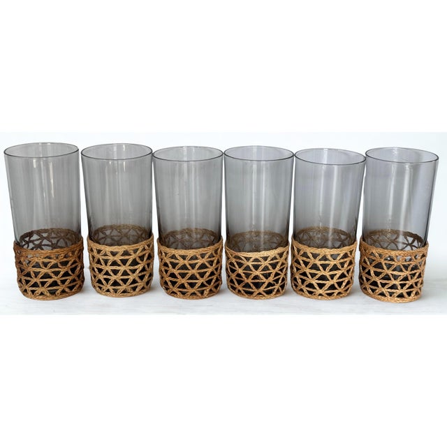 Here is yet another reason why we love vintage! Presenting a set of 6 smoked glass gray highball drinkware / barware with...