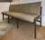 Stylish Modern Channeled Taupe Vintage Style Leather Dining Bench, dark wood base, showroom floor sample