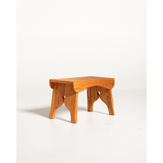 Swedish stool from the 1960s, made entirely of pine and featuring a simple structure that highlights the natural grain of...