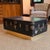 Vintage R.L. Macy Steamer Trunk on Base A fabulous, one-of-kind coffee table. A vintage steamer trunk marked R.L Macy with...