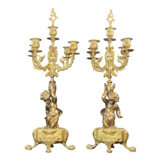 Antique French Bronze Cherub Candelabra - a Pair For Sale