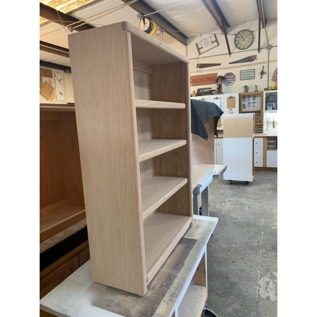 Elevate your space with authentic craftsmanship. This isn't "flat-pack" furniture. This is a bench-made, solid wood...