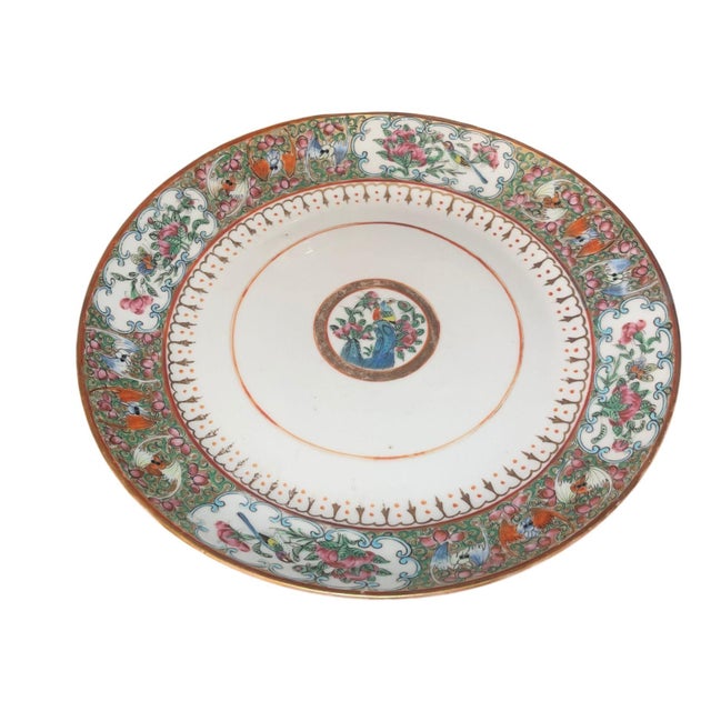 An elegant set of seven Chinese Export Rose Mandarin porcelain plates dating to the mid-19th century. Finely hand-painted...
