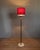 Floor lamp with marble base, metal and brass body, red fabric lampshade, with three lights that can be turned on together...