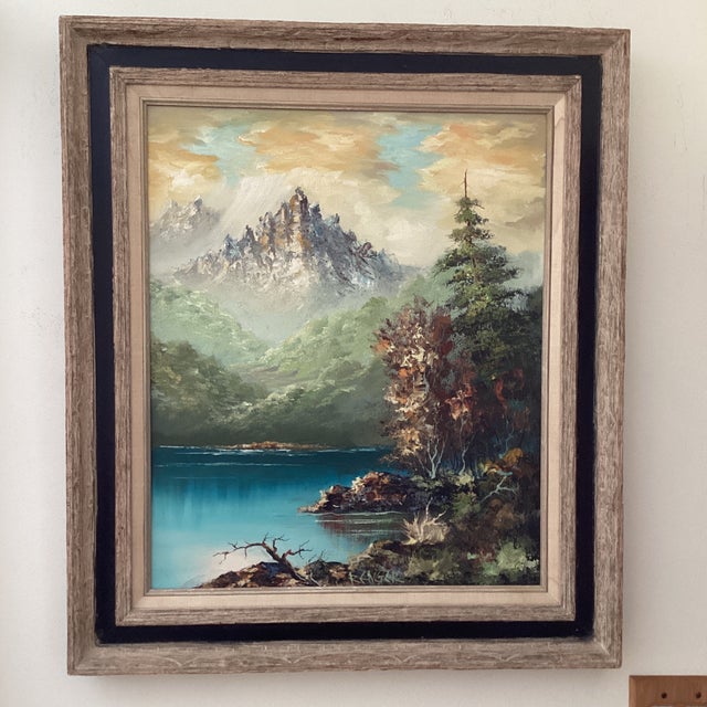 The product is a Mid 20th century original oil painting on canvas titled "Misty Mountain." This nature-themed artwork,...